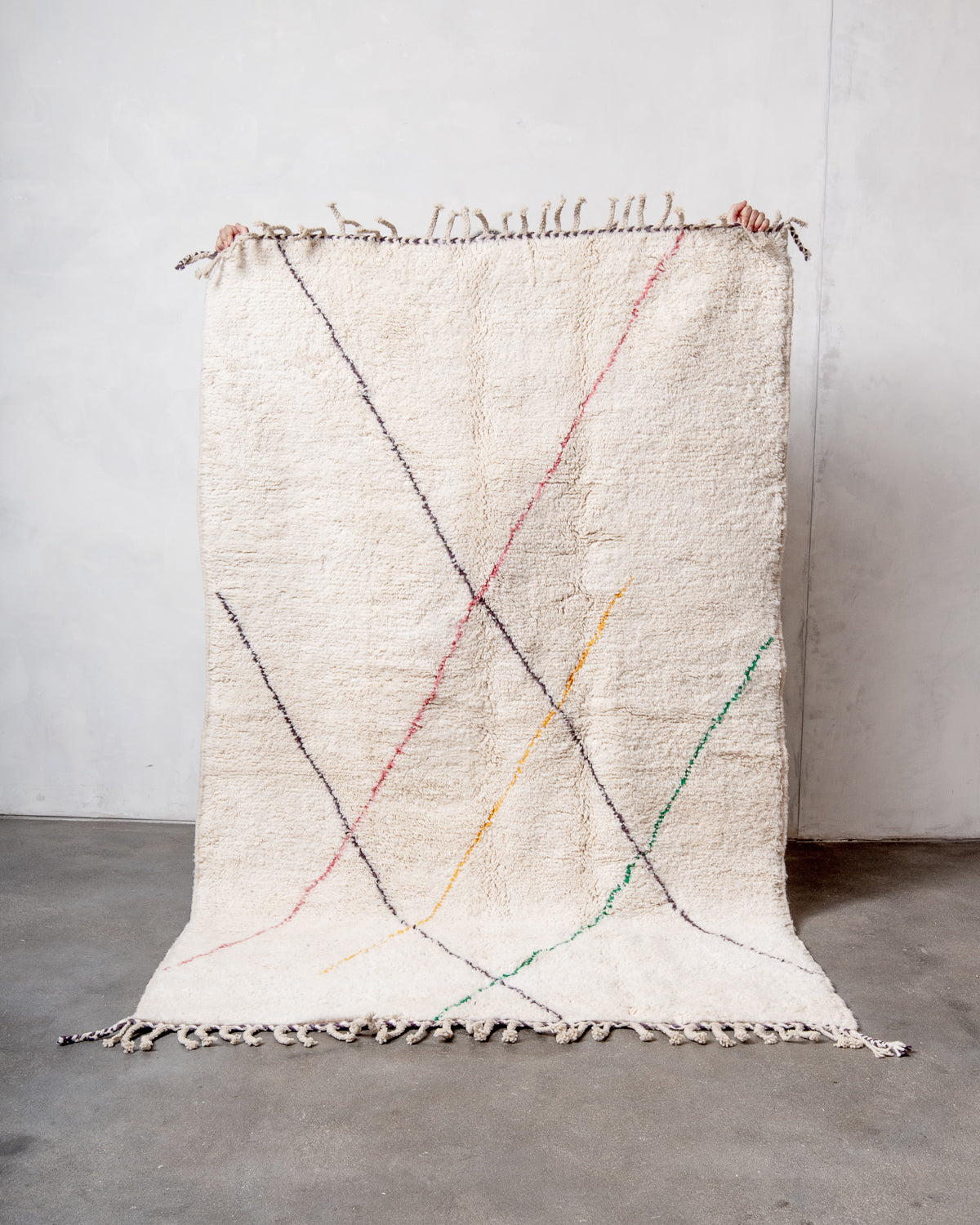 Modern, designer, handcrafted Berber rug from Morocco. Beniourain carpet with beautiful colours and patterns and fluffy wool texture.